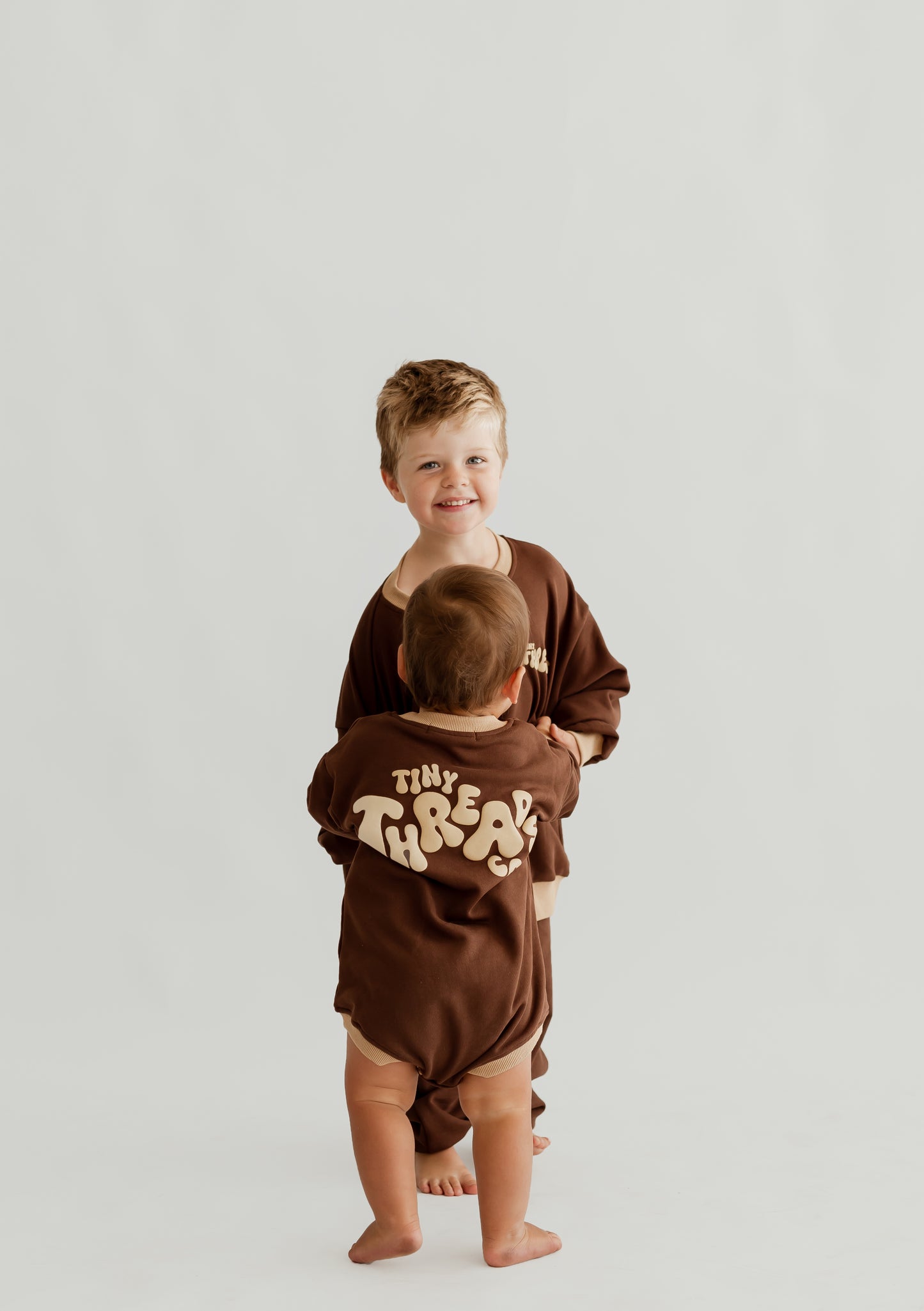 Chocolate long sleeve romper