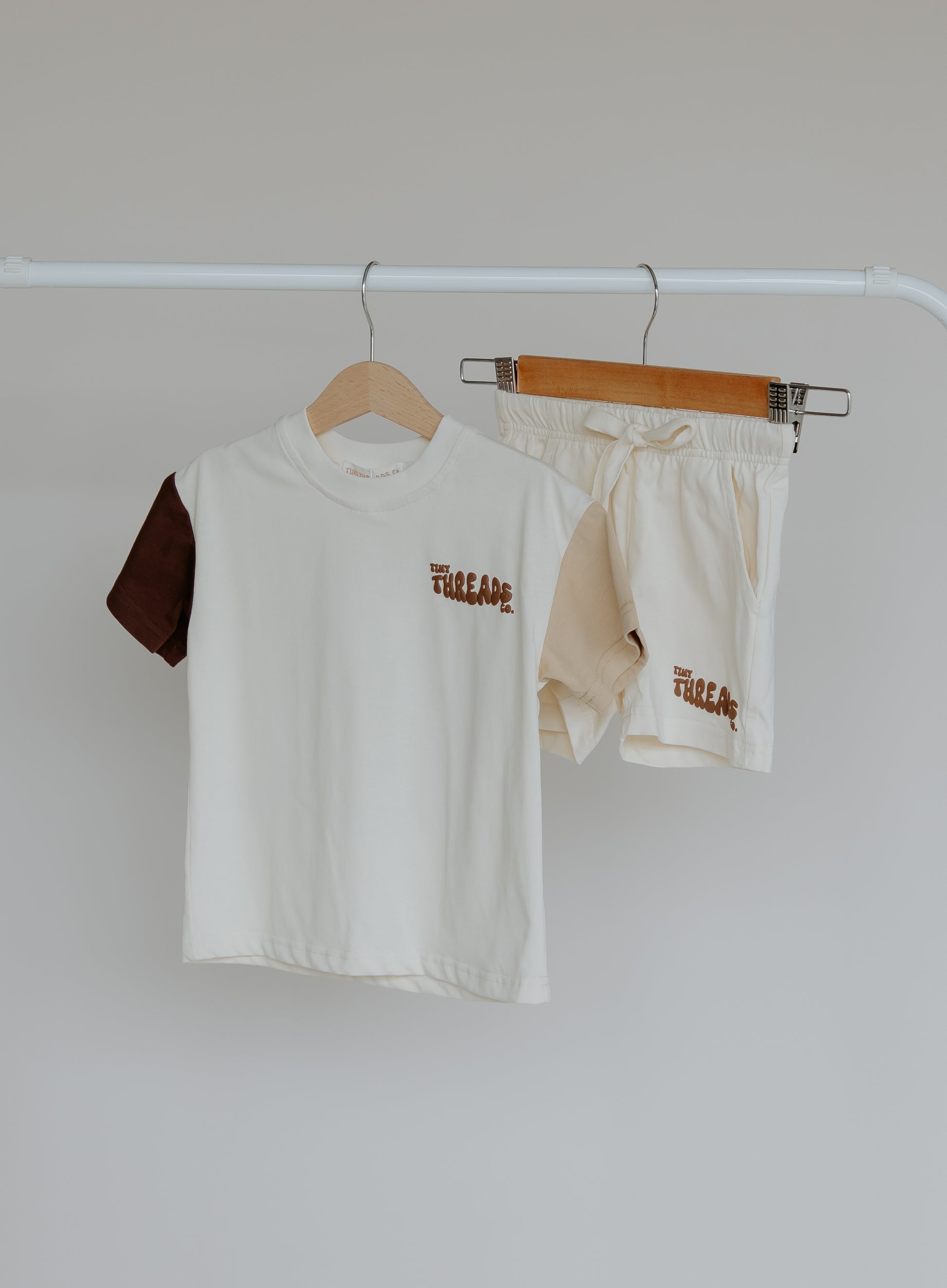 Tiny Threads Co. oversized short sleeve set in brown, front on view