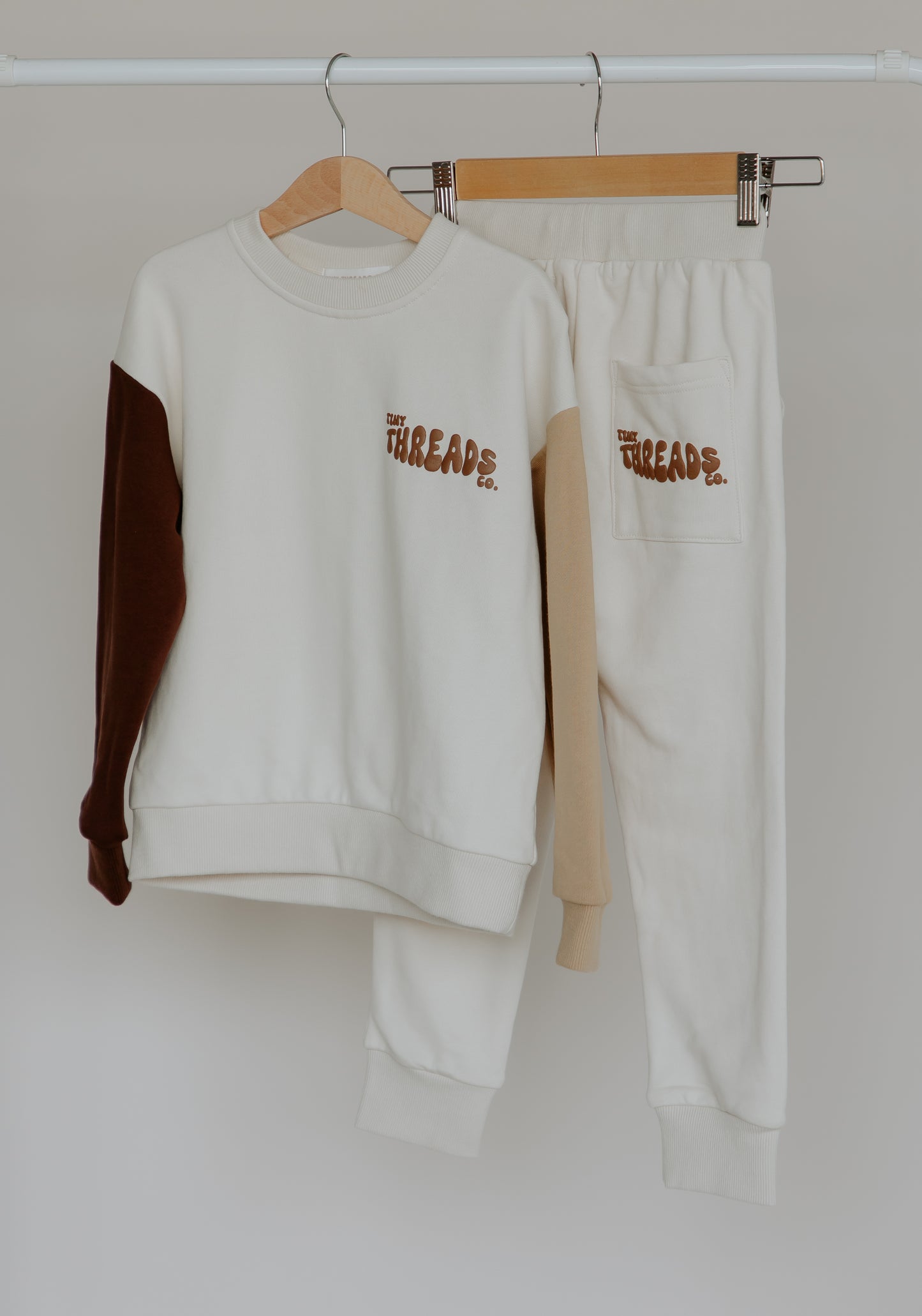 Tiny Threads Co. oversized long sleeve set in brown front view of jumper, rear of pants