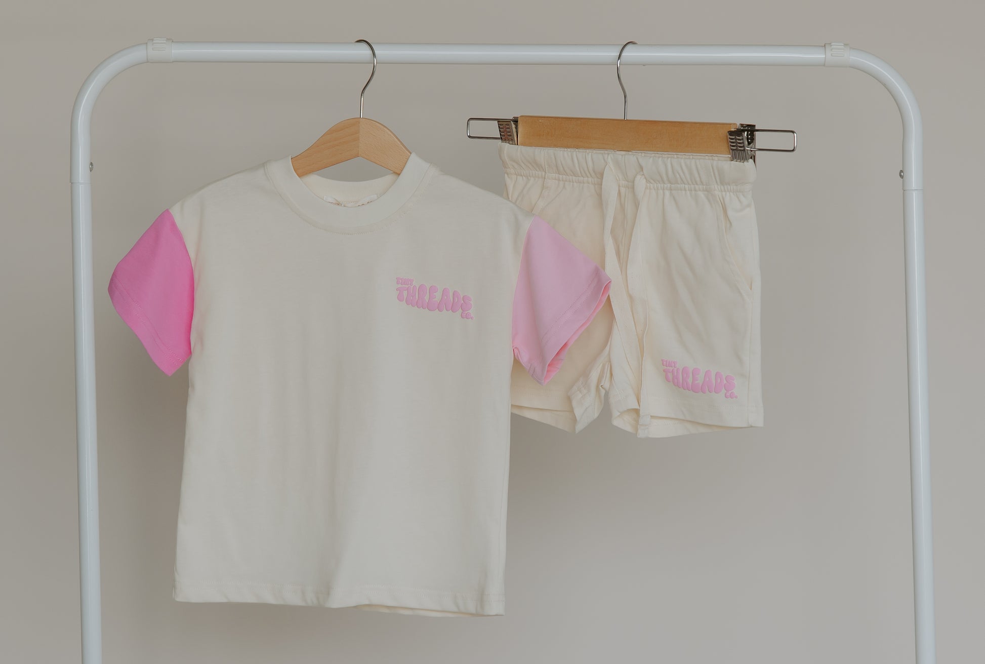 Tiny Threads Co. oversized short sleeve set in pink, front on view