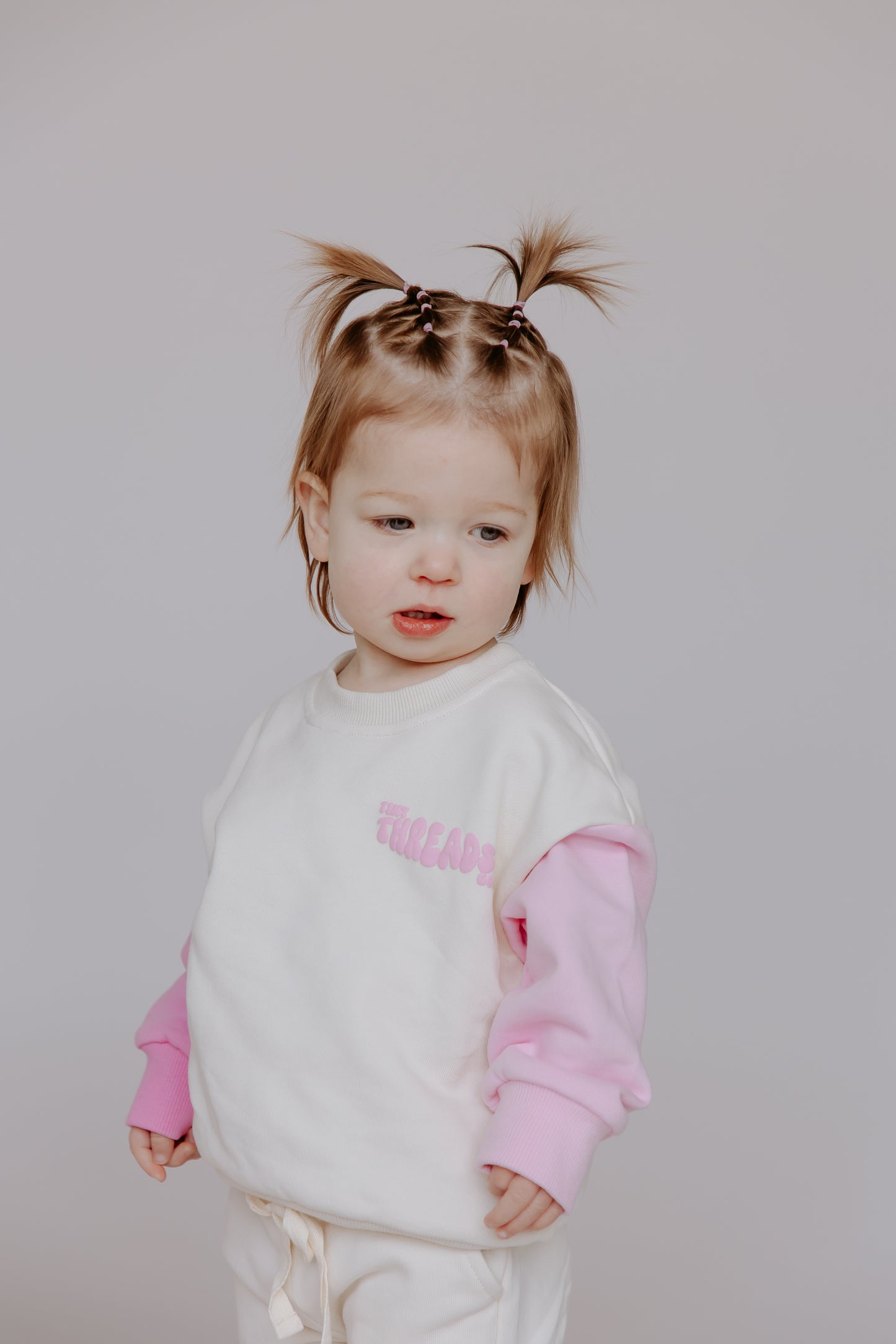 Tiny Threads Co. oversized long sleeve set in pink worn by I aged 18 months