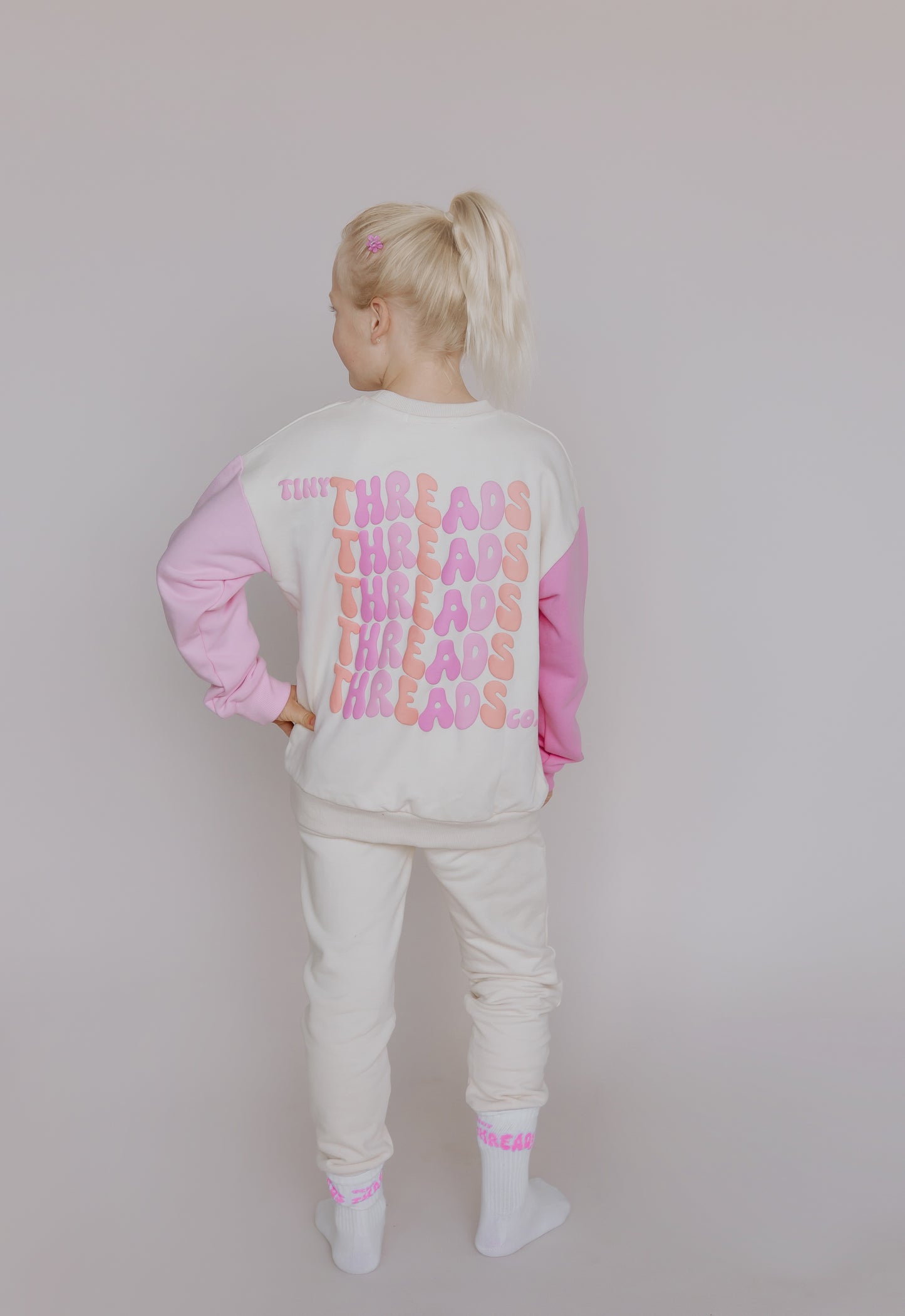 Tiny Threads Co. oversized long sleeve set in pink, worn by Z aged 7