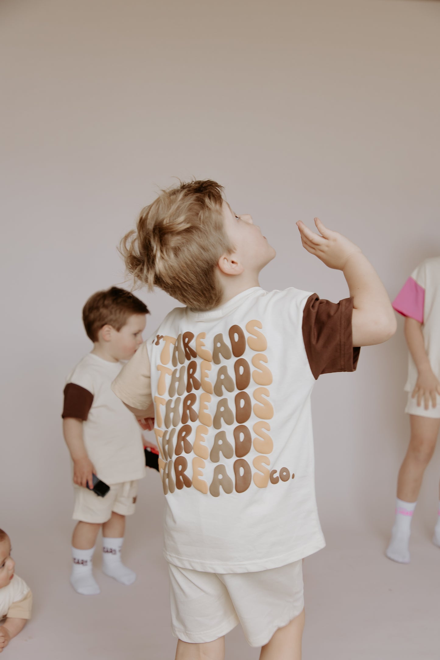 Tiny Threads Co. oversized short sleeve set in brown, worn by L aged 4.5 years